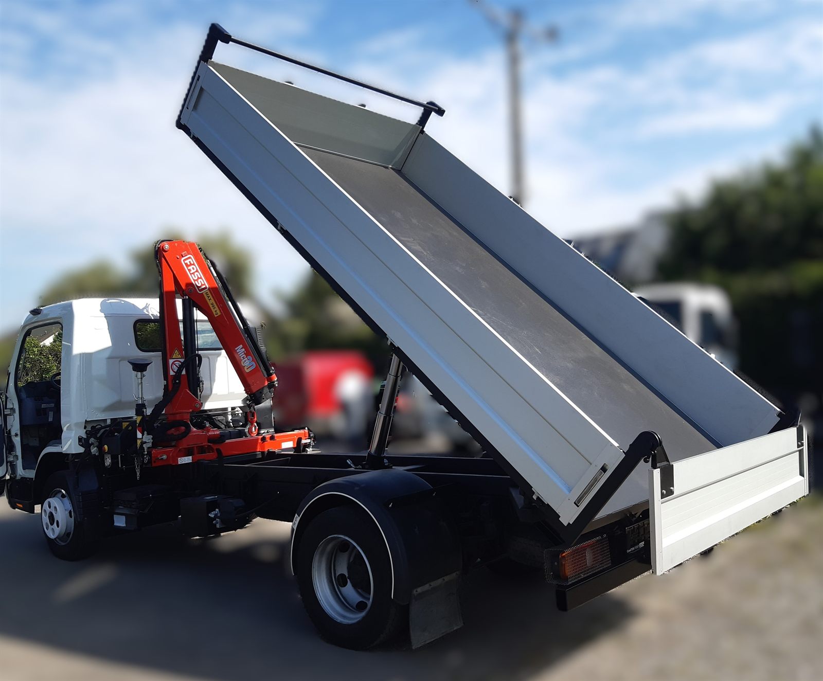 Mitsubishi Fuso Canter with a raised steel tipper body with aluminium side boards, built by TOPSTONE